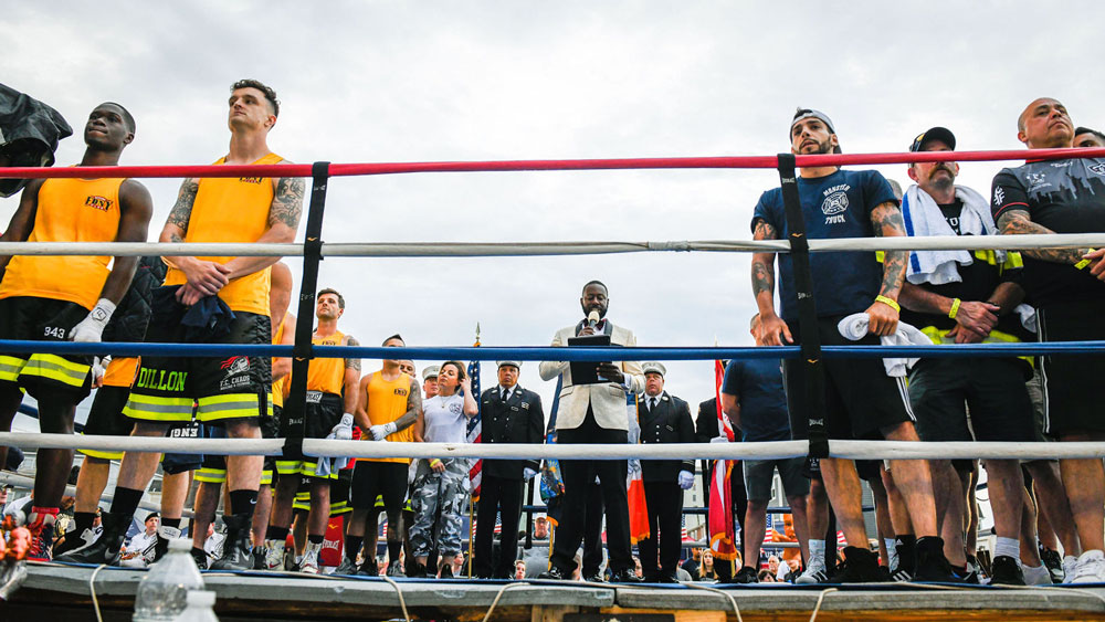 Justin Manning announcing the Thrilla in Camilla 6 featuring the FDNY Boxing  Club versus the UK's West Yorkshire Fire Firefighters. Proceeds from the event benefitted the Tunnel to Towers Foundation in Rockaway Beach, NY  and bouts sanctioned by USA Boxing Metropolitan
